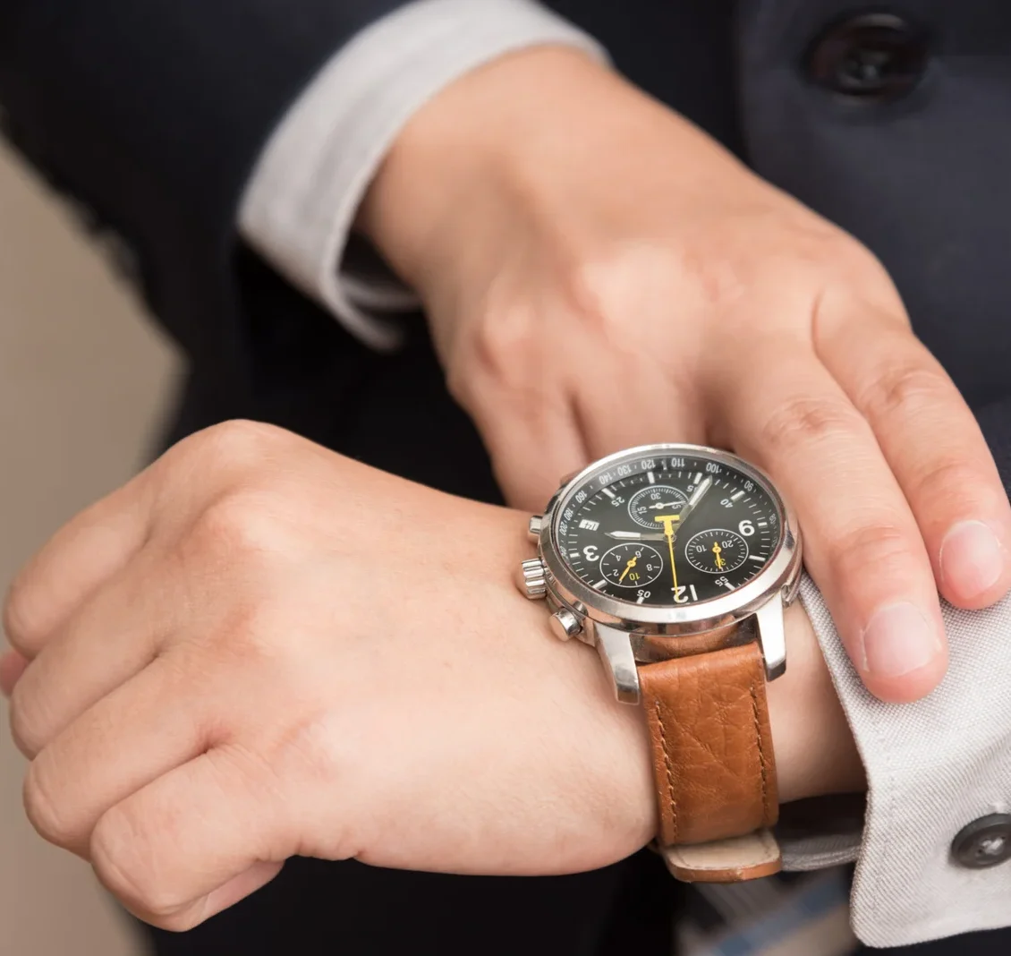 businessman-checking-time-scaled